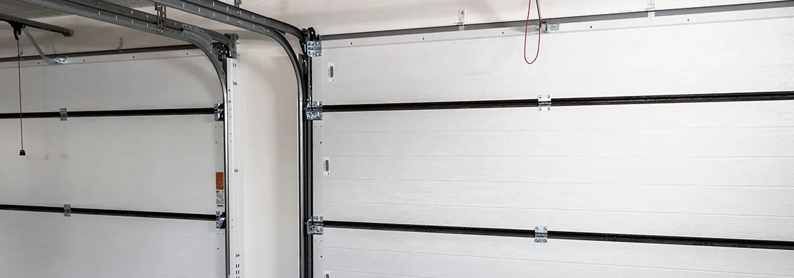 Fix Folding Garage Door Jerking in Muskoka, Ontario