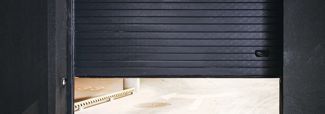 Residential Black Garage Door Installation in Muskoka, ON